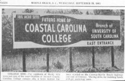1961 news photo billboard announcing future campus